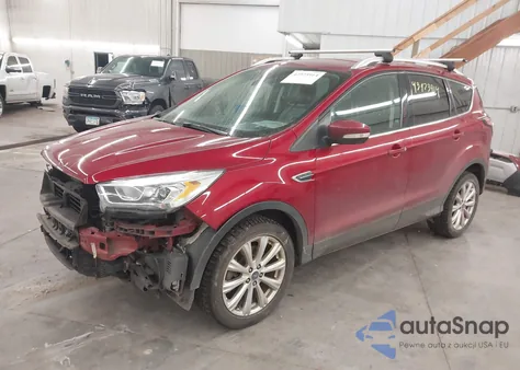 2017 Ford Escape Titanium z USA, uszkodzony, nr VIN 1FMCU9J91HUD59747